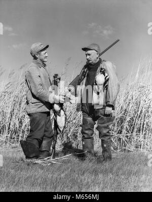 Two people duck hunting in North Dakota Stock Photo - Alamy