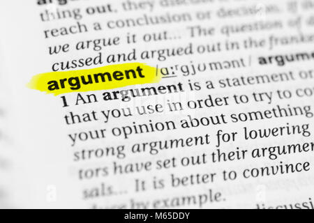 Highlighted English word 'argument' and its definition in the dictionary. Stock Photo
