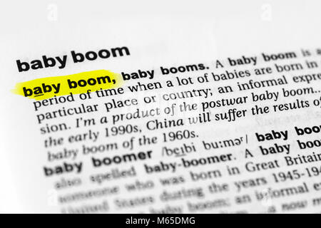 Highlighted English word 'baby boom' and its definition in the dictionary. Stock Photo