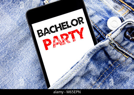 Hand writing text caption inspiration showing Bachelor Party. Business concept for Stag Fun Celebrate Written phone mobile phone, cellphone placed in  Stock Photo