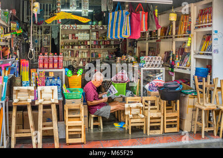 Indonesia, Central Java, Yogyakarta, Malioboro, shop keeper at Jalan Pajeksan Stock Photo