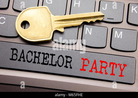 Hand writing text caption inspiration showing Bachelor Party. Business concept for Stag Fun Celebrate written on keyboard key on the key next to the t Stock Photo