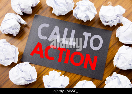 Hand writing text caption showing Call To Action. Business concept for Proactive Success Goal written on sticky note paper the wooden background with  Stock Photo