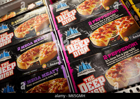 Frozen Chicago Town pizza in the freezer section of shop Stock Photo