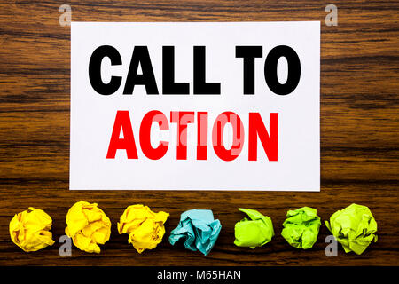 Hand writing text caption inspiration showing Call To Action. Concept for Proactive Success Goal Written on sticky, with sticky, one folded paper alon Stock Photo