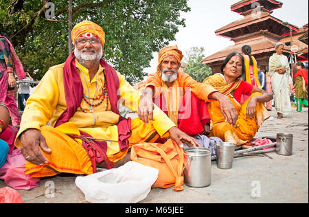 KATHMANDU, NEPAL - MAY 19: Holy Sadhues  with traditional blessing in Durbar Square on May 19, 2013 in Kathmandu, Nepal. Stock Photo