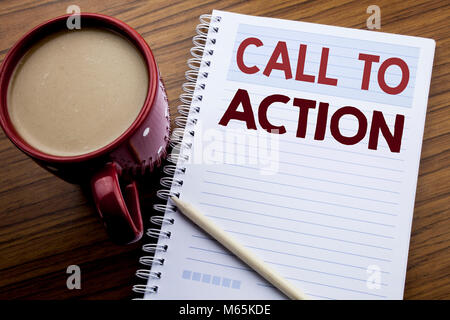 Hand writing text caption inspiration showing Call To Action. Business concept for Proactive Success Goal written on note paper notepad on the wooden  Stock Photo