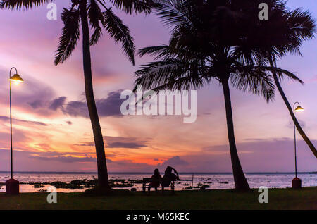 Relaxing in the beautiful sunset over Lake Vembanad in the backwaters in Kerala, India. Stock Photo