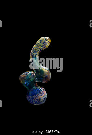 Pearlized Glass bong in greens, blues, yellows, gold, cobalt, orange and aqua isolated on black Stock Photo