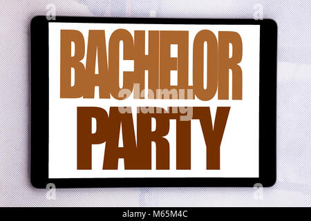 Hand writing text caption inspiration showing Bachelor Party. Business concept for Stag Fun Celebrate written on tablet screen on white background. Stock Photo