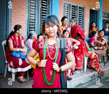 POKHARA, NEPAL-MAY 25. 2013: An unidentified Nepalese woman posing for photo during the nepal public holidey Buddha Jayanty on May 25, 2013 in Pokhara Stock Photo