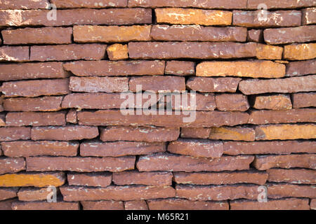 Brick wall made of stone tiles Stock Photo