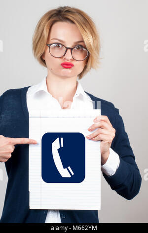 Woman ring me sign and pointing Stock Photo - Alamy