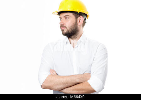 Contractor in yellow helmet on white background. Architect in builder helmet. Stock Photo