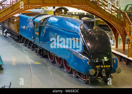 View of the Great Hall at the National Railway Museum York with streamlined steam locomotive Mallard world speed record holder for steam train Stock Photo