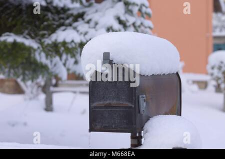 Isolated snowy postbox - mailbox (Pesaro, Italy) Stock Photo