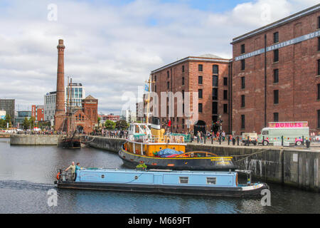 Canal narrowboat manoevering, Albert Dock, Liverpool, Merseyside, England, UK, United Kingdom