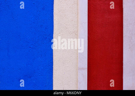 Painted Blue, White and Red Wall Background Stock Photo