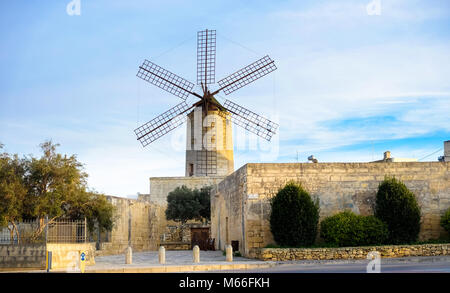 Old traditional windmill in Malta. Now an important tourist attraction. Abandoned structure. Stock Photo