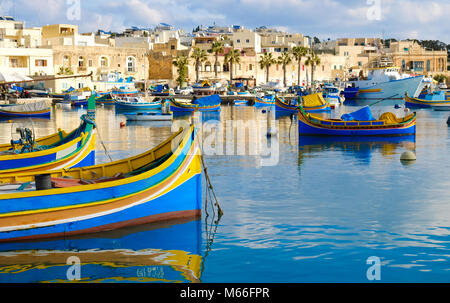 Luzzu famous fishing boats in Marsaxlokk - Malta Stock Photo