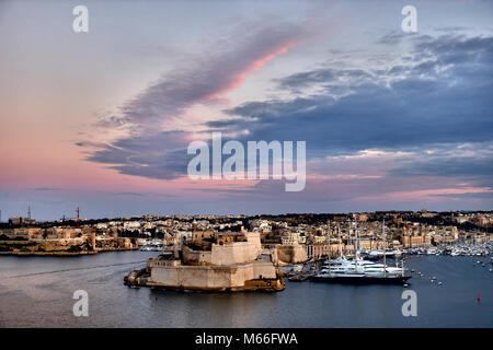 Valletta fortress at dusk - Malta. Panorama Stock Photo