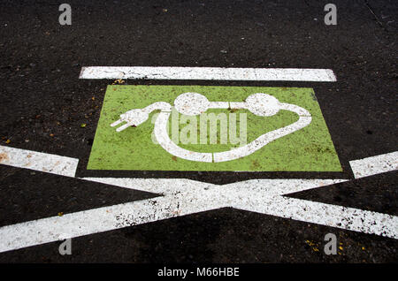Ecological electromobile transport road sign on city asphalt Stock Photo