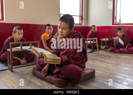 Gangtok, India - May 3, 2017: Lesson for novice monks in buddhist Tsuglakhang monastery in Gangtok, India Stock Photo