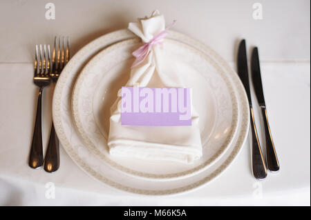 Festively decorated table for wedding celebration in restaurant. Stock Photo