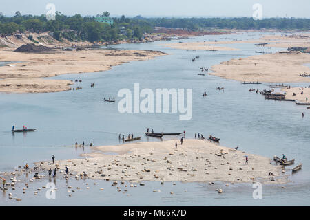 Dawki, India - May 15, 2017: Indian tourists riding boats on Umngot river near the Dawki village, Meghalaya, North East India Stock Photo