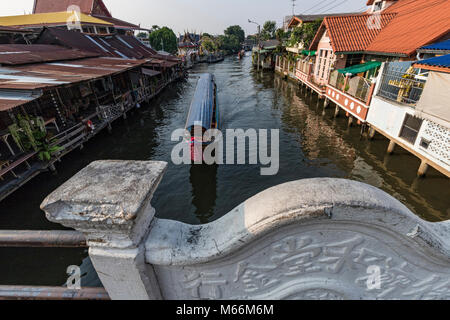Bangkok Khlongs and canals - A khlong also commonly spelled Klong is the Thai word for a canal. These canals are fed by the Chao Phraya, the Tha Chin, Stock Photo