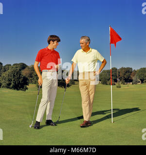 1960s 1970s TEENAGE BOY AND MIDDLEAGED FATHER ON GOLF COURSE GREEN LEANING ON CLUBS TALKING - kg3983 HAR001 HARS EXERCISING HEALTH SPEAKING CLOTHING LISTENING NOSTALGIC PAIR STYLISH SUBURBAN COLOR OLD TIME TEACHING LEANING OLD FASHION 1 FITNESS JUVENILE STYLE COMMUNICATION HEALTHY TEAMWORK TWO PEOPLE COMPETITION CAUCASIAN ATHLETE SONS PLEASED JOY LIFESTYLE SATISFACTION CELEBRATION COPY SPACE FRIENDSHIP FULL-LENGTH ADOLESCENT INSPIRATION CARING TEENAGE BOY ATHLETIC CONFIDENCE NOSTALGIA FATHERS CLUBS TOGETHERNESS 16-17 YEARS 40-45 YEARS 45-50 YEARS SUCCESS ACTIVITY COURSE DREAMS HAPPINESS Stock Photo
