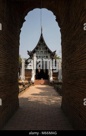 Wat Lok Moli is a temple in Chiang Mai that features a 14th century chedi with trees nd bushes growing out of it,  and an impressive prayer hall. Just Stock Photo