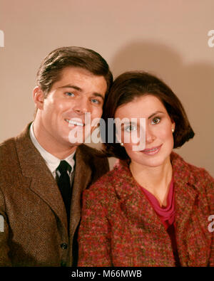 1960s 1960s SMILING PORTRAIT OF BRUNETTE COUPLE LOOKING AT CAMERA - kp1151 HAR001 HARS SMILES CONNECTION JOYFUL MID-ADULT MID-ADULT MAN MID-ADULT WOMAN CAUCASIAN ETHNICITY LOOKING AT CAMERA OLD FASHIONED Stock Photo