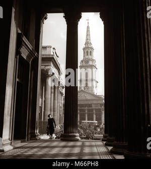 1930s ANONYMOUS SILHOUETTED WOMAN WALKING COLONNADE ST. MARTINS IN THE FIELD CHURCH LONDON ENGLAND - r7521 HAR001 HARS HISTORIC SUCCESS HAPPINESS ADVENTURE SILHOUETTED COLUMN EXCITEMENT KNOWLEDGE RECREATION TOURIST DIRECTION COLUMNS HOLIDAYS TOURISTS TRAVELING ST. VACATIONS VISITING ANONYMOUS TRAVEL EUROPE TRAVELER ARCHITECTURAL DETAIL MID-ADULT MID-ADULT WOMAN RESORTS B&W BLACK AND WHITE CAPITAL CITY COLONNADE FEMALES] MARTINS OLD FASHIONED PERSONS ST. MARTINS IN THE FIELD Stock Photo