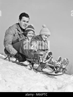 1930s 1940s FATHER TWO CHILDREN ON SLED IN SNOW GOING DOWN HILL - w4217 HAR001 HARS OLD TIME BROTHER OLD FASHION SISTER 1 JUVENILE STYLE BALANCE SAFETY TEAMWORK CAUCASIAN SONS PLEASED JOY LIFESTYLE SPEED PARENTING CELEBRATION FEMALES BROTHERS RURAL SLED SLEDDING HILL COPY SPACE FULL-LENGTH DAUGHTERS RISK SIBLINGS CONFIDENCE SISTERS NOSTALGIA FATHERS TOGETHERNESS WINTERTIME 25-30 YEARS 3-4 YEARS 30-35 YEARS FREEDOM 5-6 YEARS HAPPINESS CHEERFUL ADVENTURE RELAXATION DADS EXCITEMENT RECREATION SLIDING PRIDE AUTHORITY SIBLING SMILES CONNECTION JOYFUL SMALL GROUP OF PEOPLE BUNDLED UP JUVENILES MALES Stock Photo