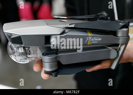 Yokohama, Japan. 1st Mar, 2018. An exhibitor shows a drone DJI MAVIC PRO Platinum at the CP  Camera & Photo Imaging Show 2018 on March 1, 2018, Yokohama, Japan. CP  is Japan's largest camera and photo imaging exhibition. This year, 1,123 exhibitor booths and approximately 70,000 visitors are expected during the four-day trade show which is held at the Pacifico Yokohama and OSANBASHI Hall until March 4th. Credit: Rodrigo Reyes Marin/AFLO/Ģ����ý Live News Stock Photo