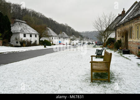 Milton Abbas, Dorset, UK. 1st Mar, 2018. UK Weather. A covering of snow at the picture postcard village of Milton Abbas in Dorset during the morning after a night of snow showers and freezing temperatures brought by the Beast from the East. Picture Credit: Graham Hunt/Alamy Live News Stock Photo