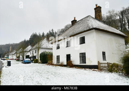 Milton Abbas, Dorset, UK. 1st Mar, 2018. UK Weather. A covering of snow at the picture postcard village of Milton Abbas in Dorset during the morning after a night of snow showers and freezing temperatures brought by the Beast from the East. Picture Credit: Graham Hunt/Alamy Live News Stock Photo