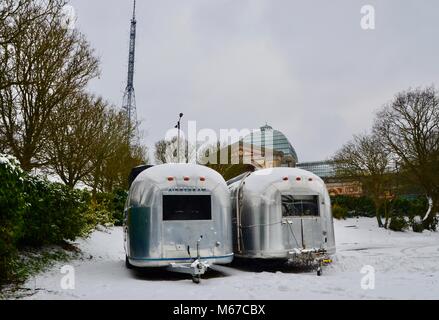 London, UK. 28th Feb, 2018. UK Weather: two snow covered airstream trailers in the grounds of north London's historic Alexandra Palace 1st March 2018 Credit: simon leigh/Alamy Live News Stock Photo