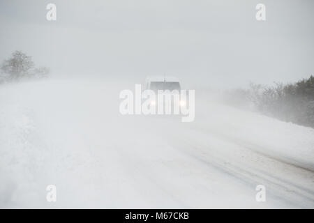 Aberdeenshire. 1st Mar, 2018. UK Weather: Traffic on the A947 negotiating near white out in heavy snow near Oldmeldrum, Aberdeenshire Scotland. 1/3/2018 Credit Paul Glendell Credit: Paul Glendell/Alamy Live News Stock Photo