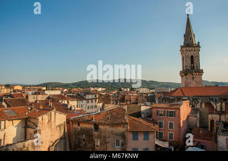 View of the gracious town of Draguignan from the hill of the clock tower, under the colorful light of the sunset. Provence region, southeastern France. Stock Photo