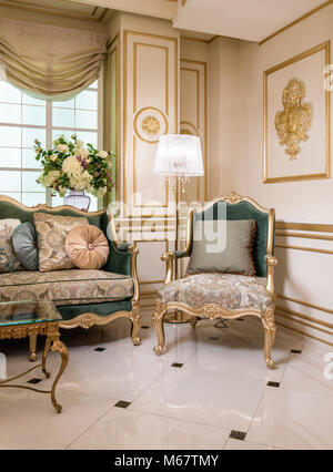 Part of classic living room with sofa and armchair 	 Stock Photo