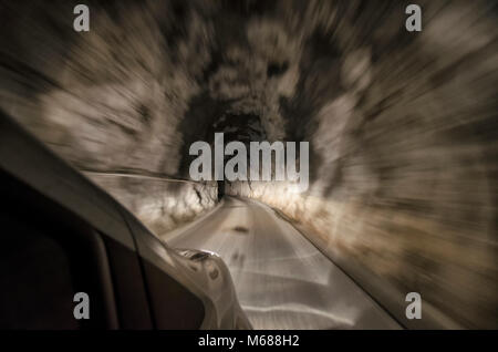 View of a tunnel from inside the car Stock Photo