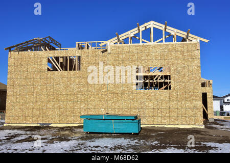 Wood frame building under construction. Stock Photo