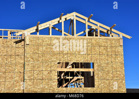 Wood frame building under construction. Stock Photo