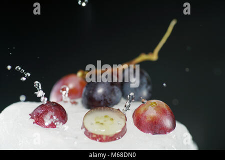 Grapes are fruits of the grapevine, individual fruits are called grape berries Stock Photo