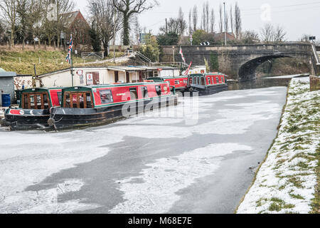 Canal boats wintering  at Preston Brook, Cheshire, UK. Stock Photo