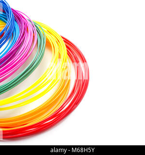 Colorful rainbow plastic filaments with for 3D pen laying on white background. New toy for child. 3d paintings and figures with their own hands. Stock Photo
