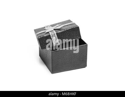 Open black gift box with silver ribbon isolated on white background Stock Photo