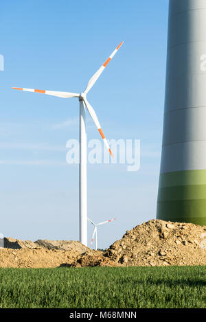 Newly errected wind turbines - concept for sustainable energy production Stock Photo